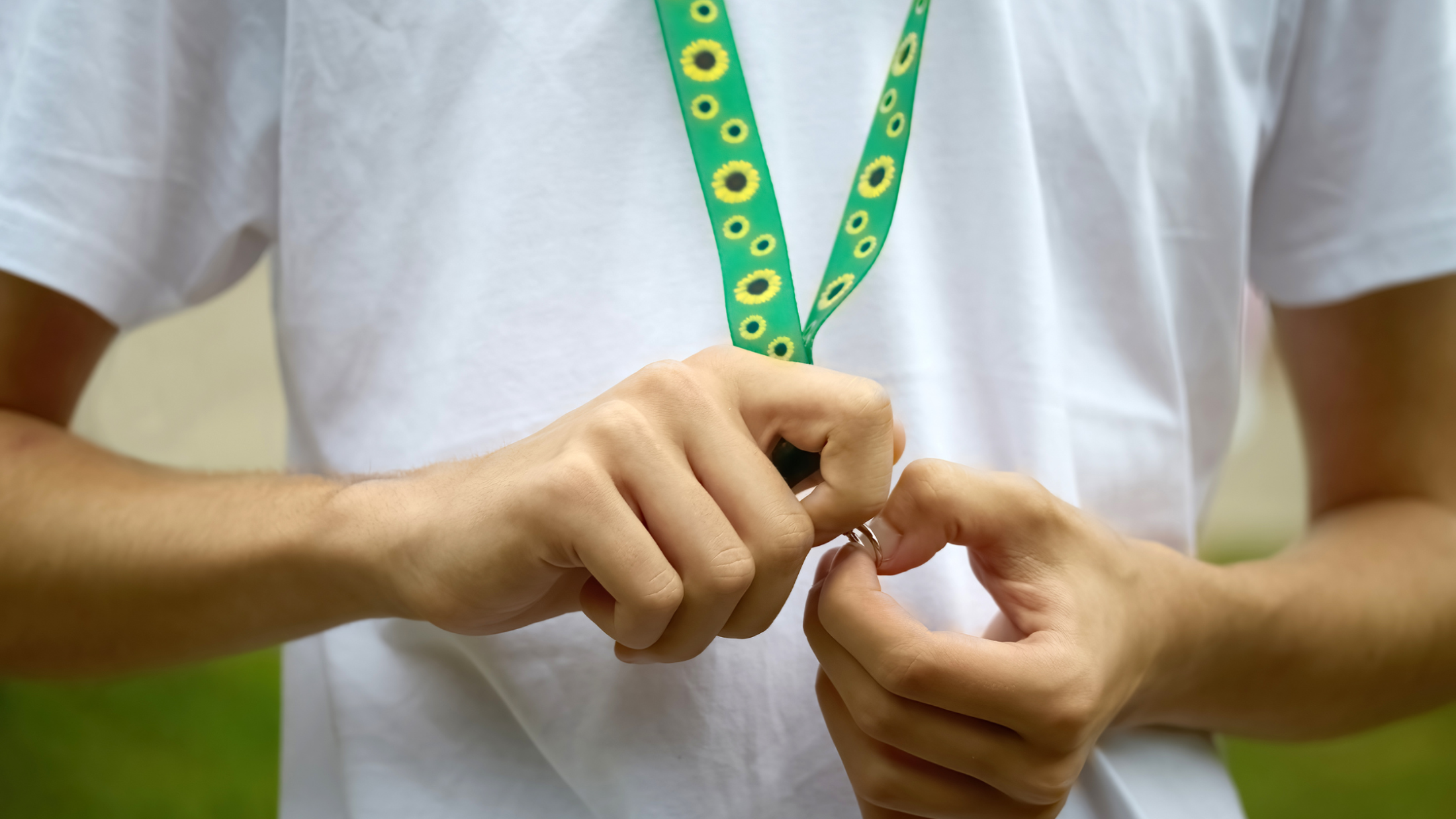 Person Wearing A Hidden Disabilities Sunflower Lanyard
